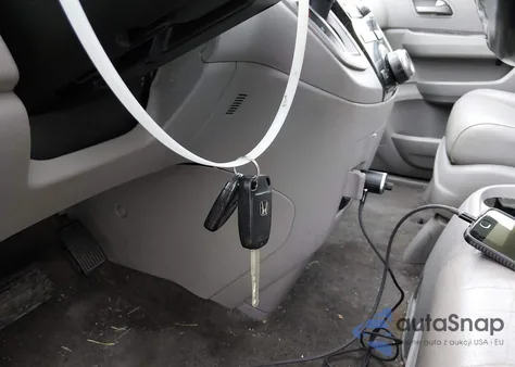 2013 Honda Odyssey Ex-L z USA, uszkodzony, nr VIN 5FNRL5H66DB039719